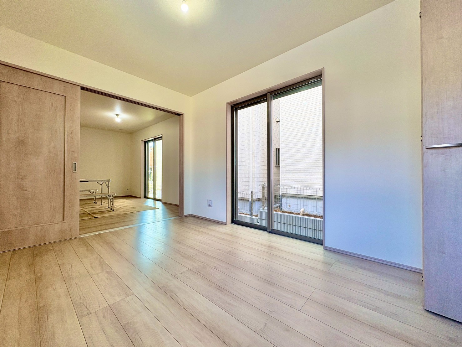 ひとつながりの空間になる、LDKと続き間居室のある間取り。