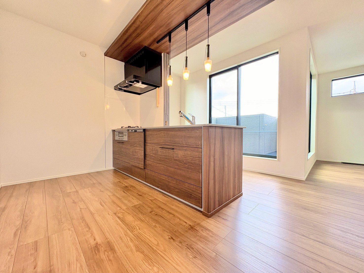 会話の弾むキッチンは自然とご家族の中心に。