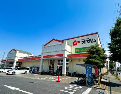 スーパーオザム栄町店まで約926m
