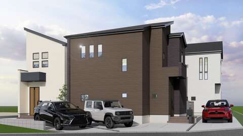 車庫付きのモダンな二階建て住宅の外観です
